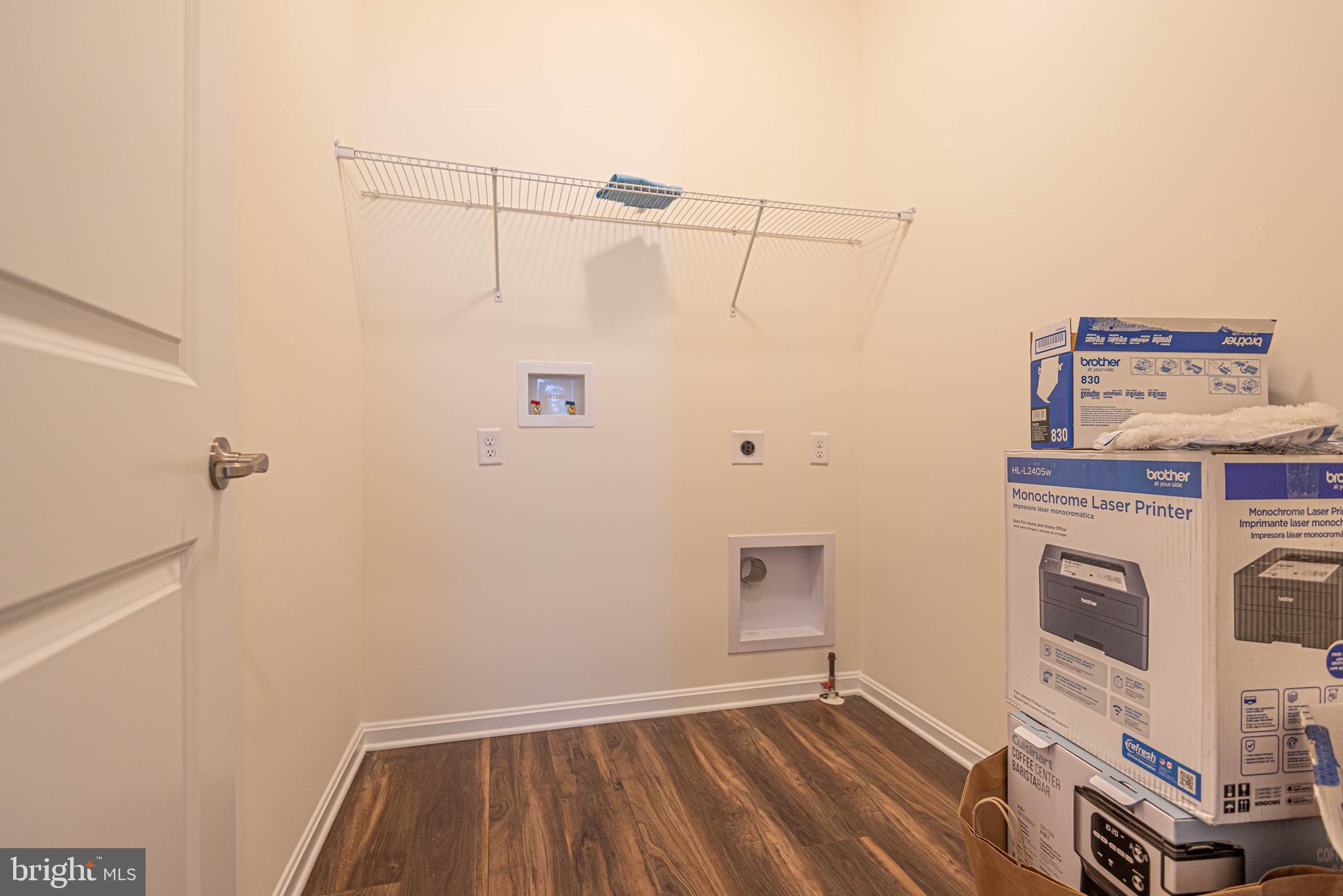 211 Prospect Street Milton, DE 19968 - Photo 56 of 64 a view of a room with racks on the wall