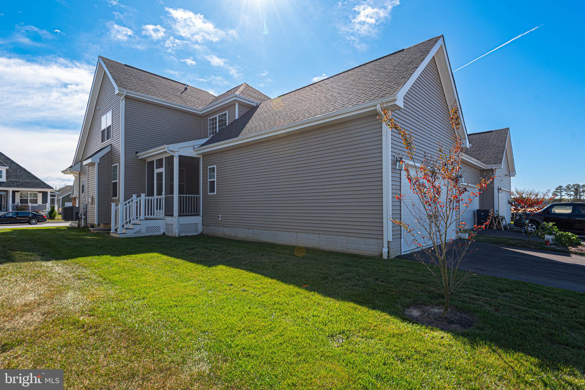 211 Prospect Street Milton, DE 19968 - Photo 64 of 64 a backyard of a house with lots of green space and plants