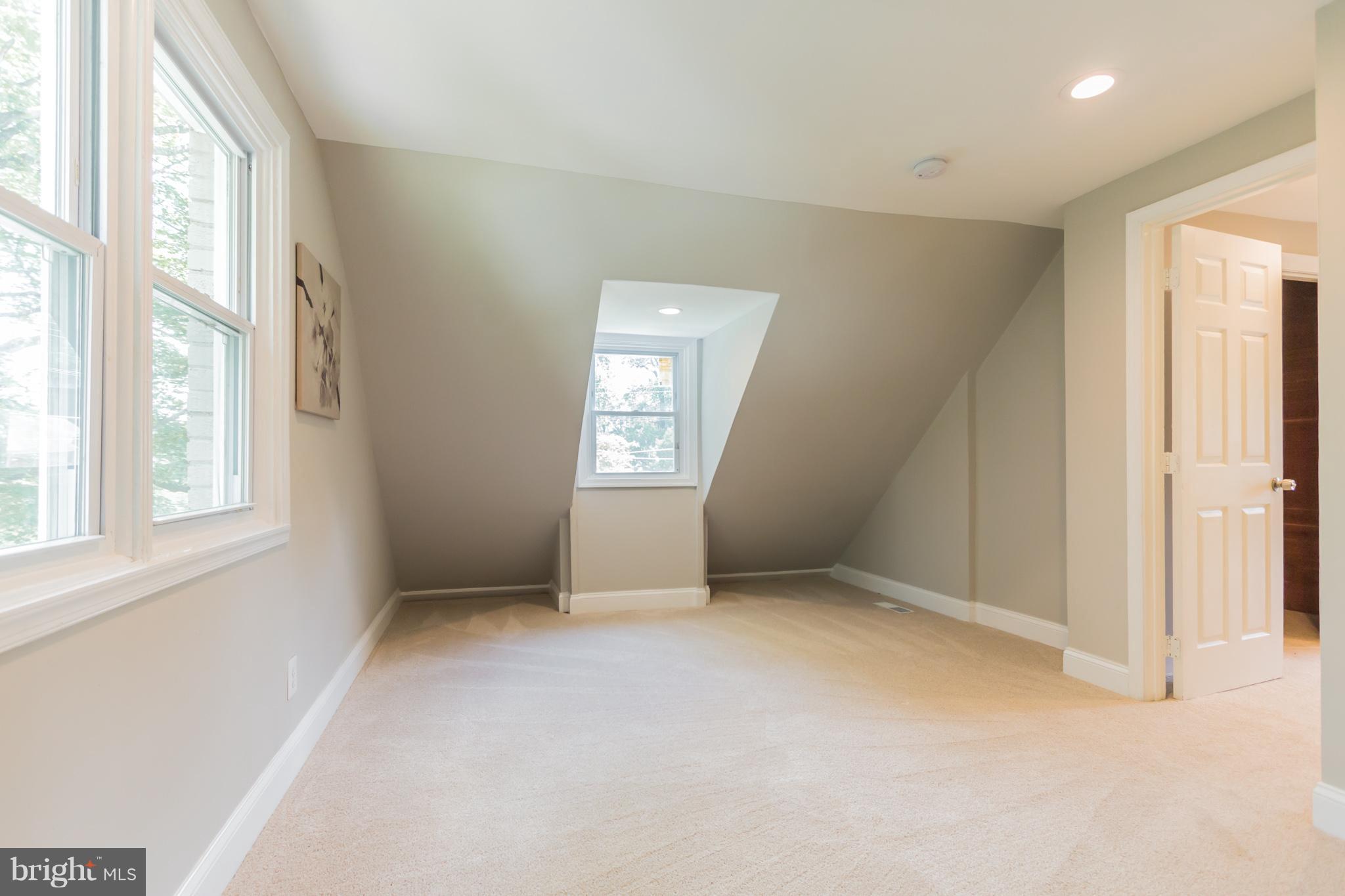 11508 Veirs Mill Road Silver Spring, MD 20902 - Photo 22 of 30 an empty room with windows