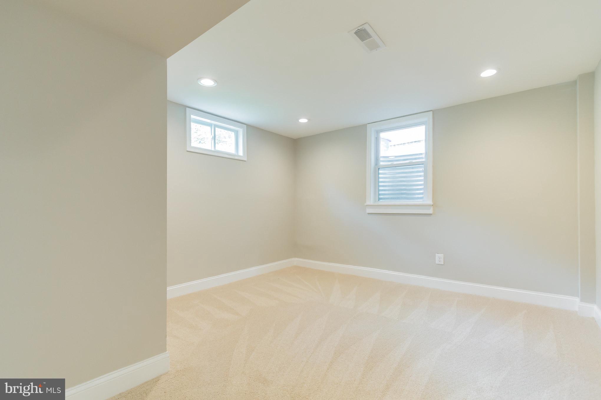 11508 Veirs Mill Road Silver Spring, MD 20902 - Photo 28 of 30 an empty room with windows
