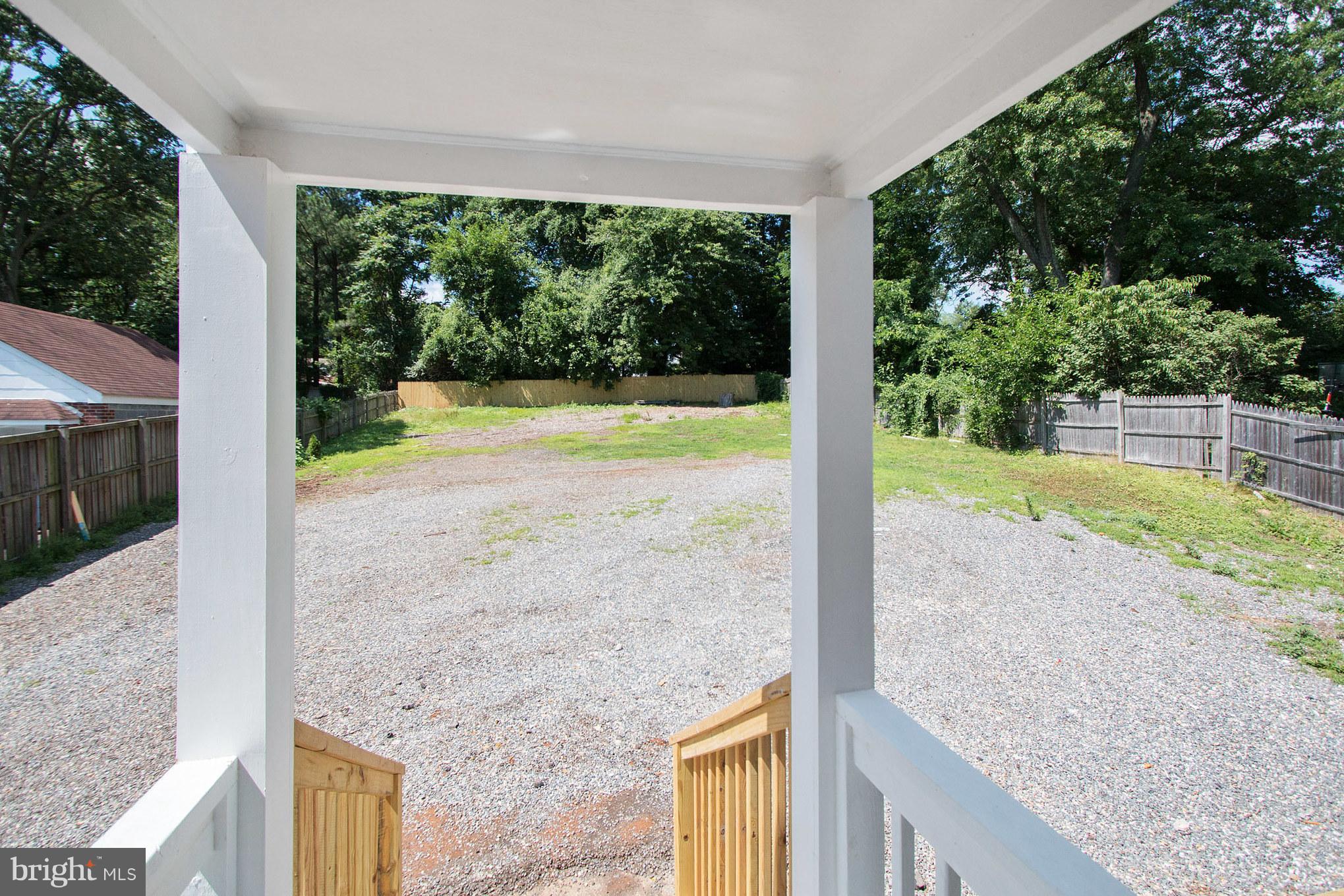 11508 Veirs Mill Road Silver Spring, MD 20902 - Photo 29 of 30 a view of a yard with porch