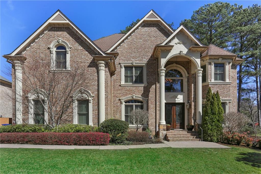 2960 Lavista Court Decatur, GA 30033 - Photo 1 of 1 a front view of a house with garden
