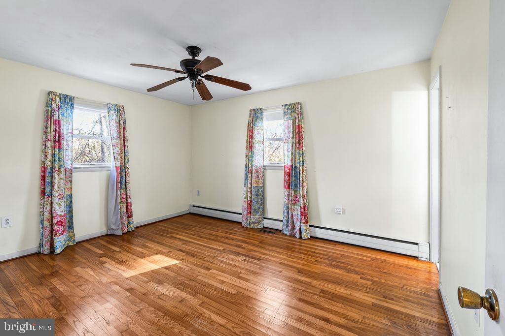 577 Brock Bridge Road Laurel, MD 20724 - Photo 15 of 41 a view of empty room with wooden floor