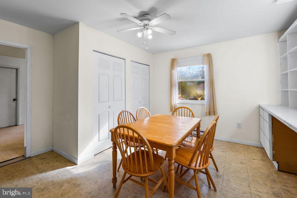 577 Brock Bridge Road Laurel, MD 20724 - Photo 22 of 41 a dining room with furniture and window