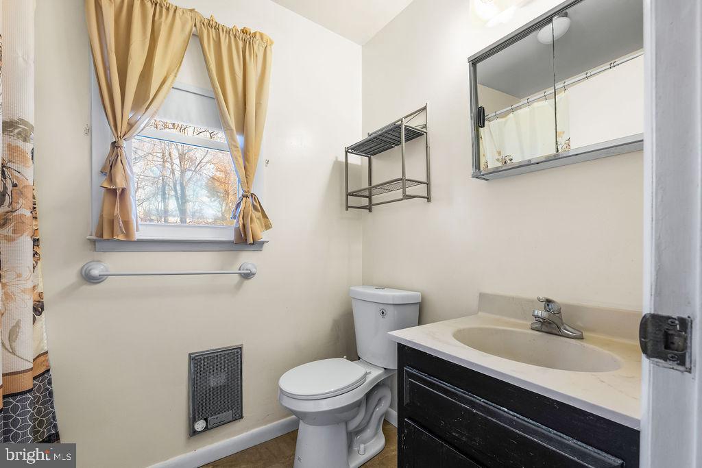 577 Brock Bridge Road Laurel, MD 20724 - Photo 24 of 41 a bathroom with a sink and a toilet