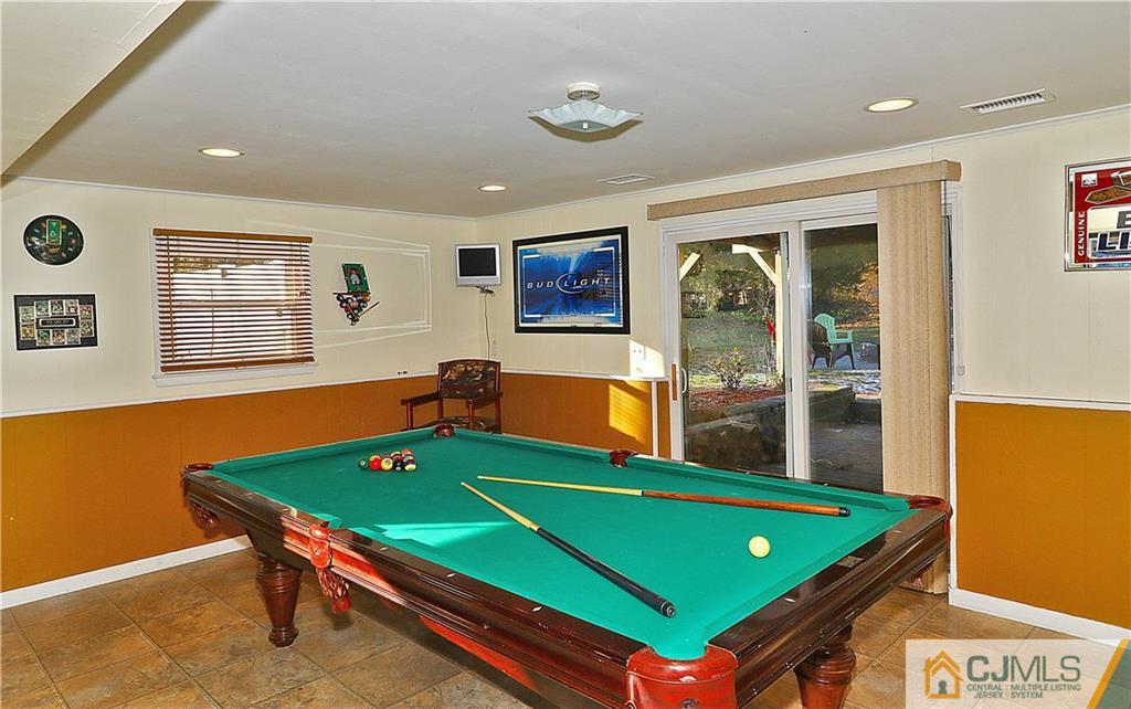 64 Valley Road Jackson, NJ 08527 - Photo 17 of 24 a room with pool table and windows