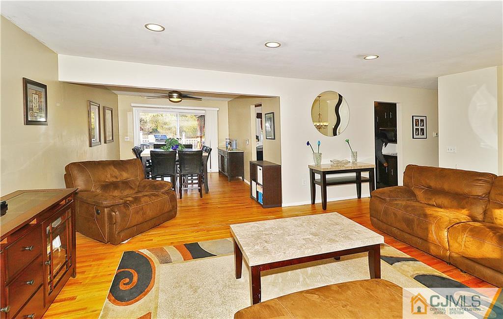 64 Valley Road Jackson, NJ 08527 - Photo 6 of 24 a living room with furniture and wooden floor