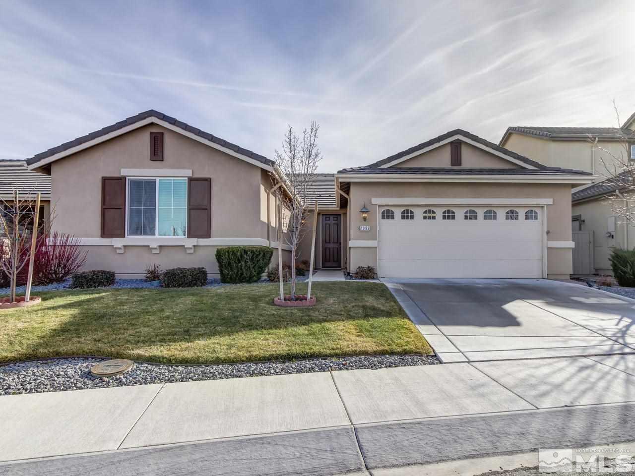 2096 Whitecliff Drive Reno, NV 89521 - Photo 1 of 22 a front view of a house with a yard