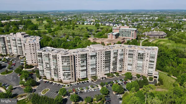 a view of a cars parked in front of a building