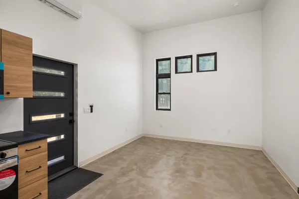 a kitchen with stainless steel appliances a refrigerator and a sink