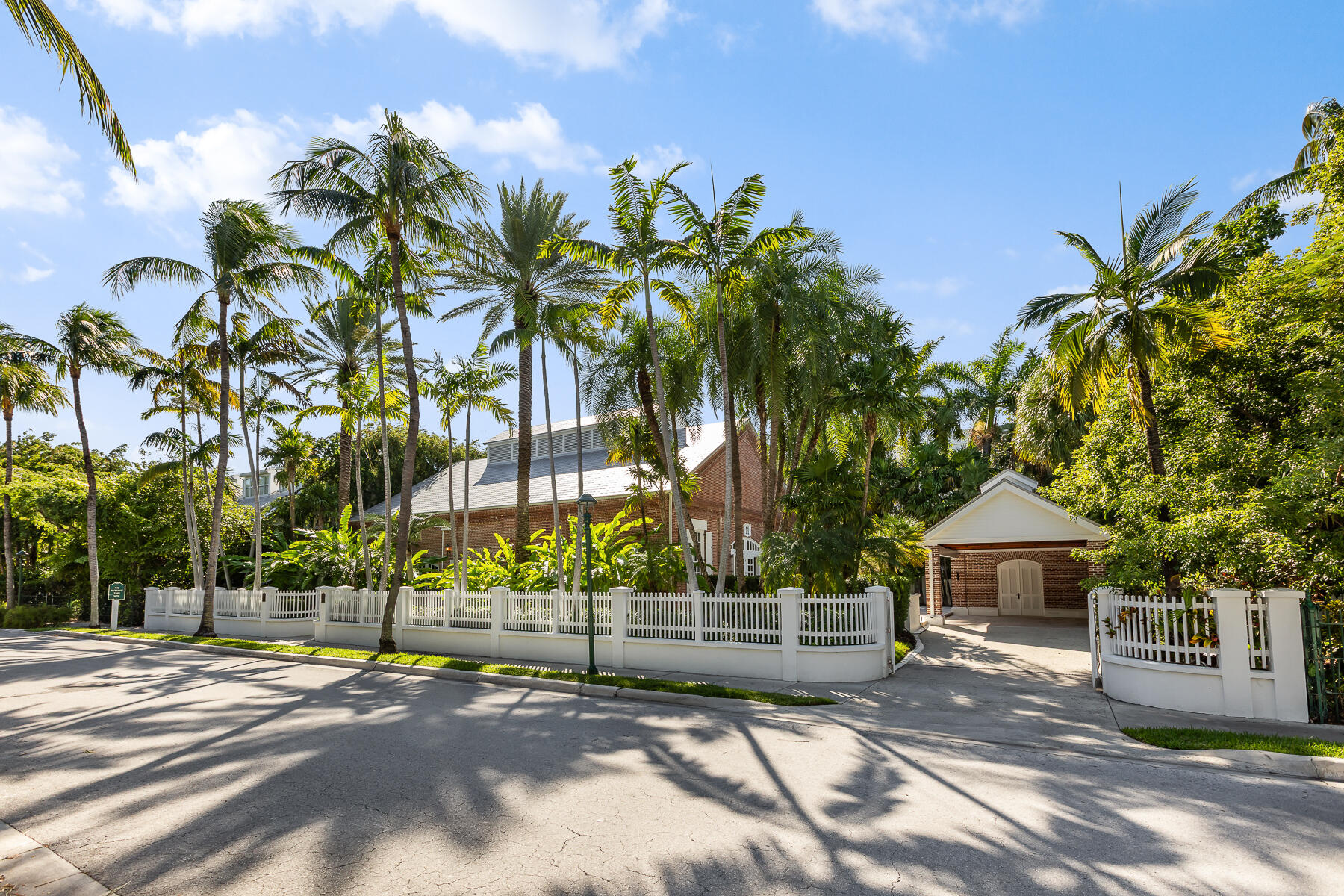 103 Front Street Key West, FL 33040 - Photo 1 of 44 a view of house with outdoor space and trees