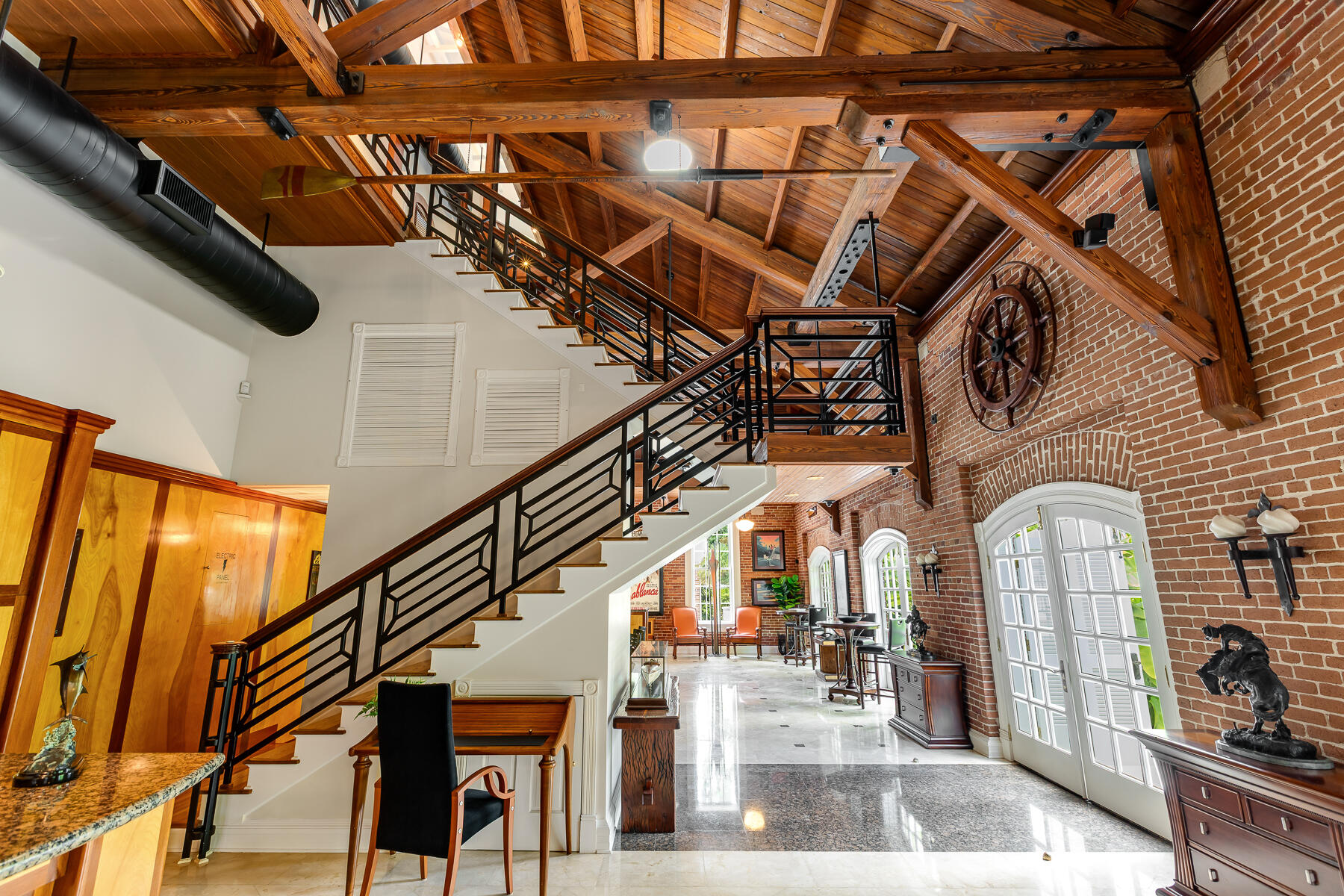 103 Front Street Key West, FL 33040 - Photo 13 of 44 a view of entryway and hall with wooden floor