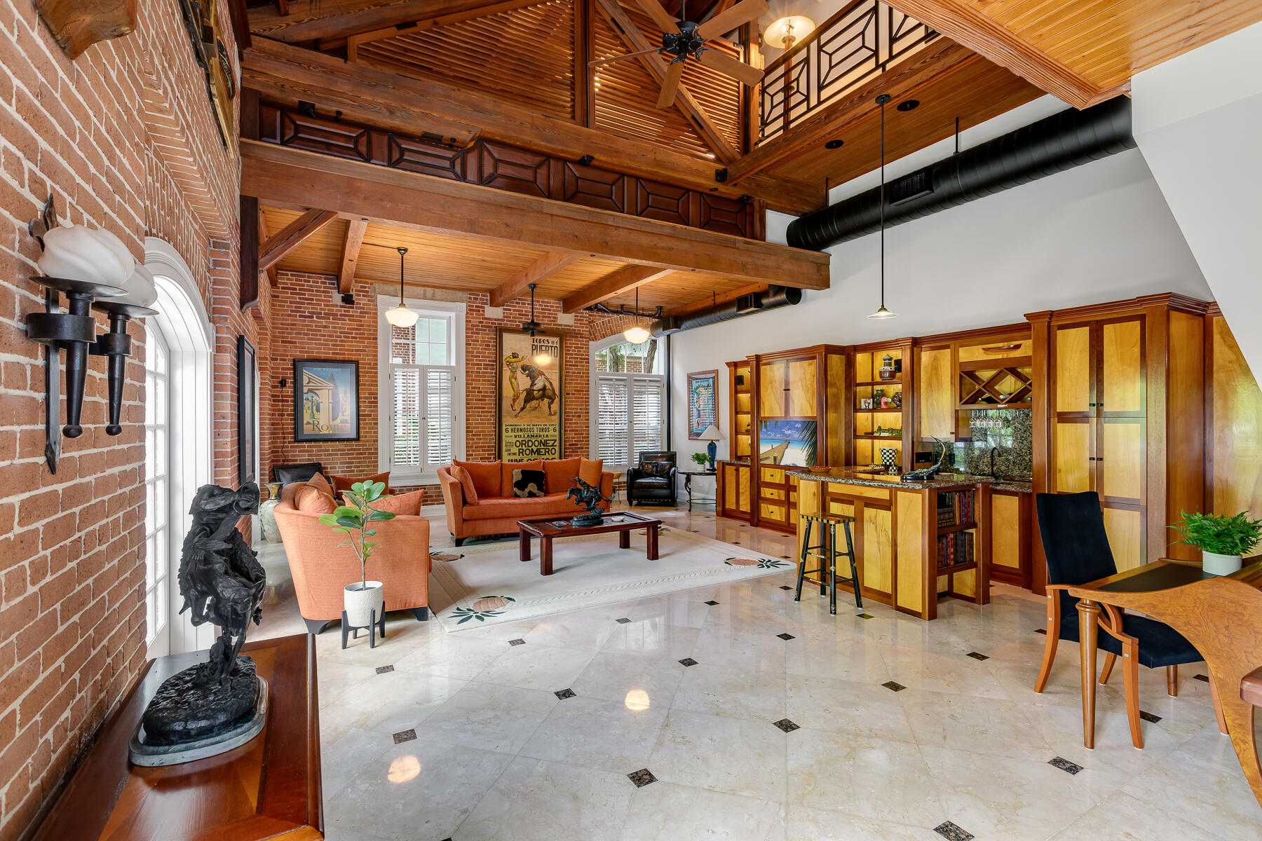 103 Front Street Key West, FL 33040 - Photo 14 of 44 a view of a patio with dining table and chairs