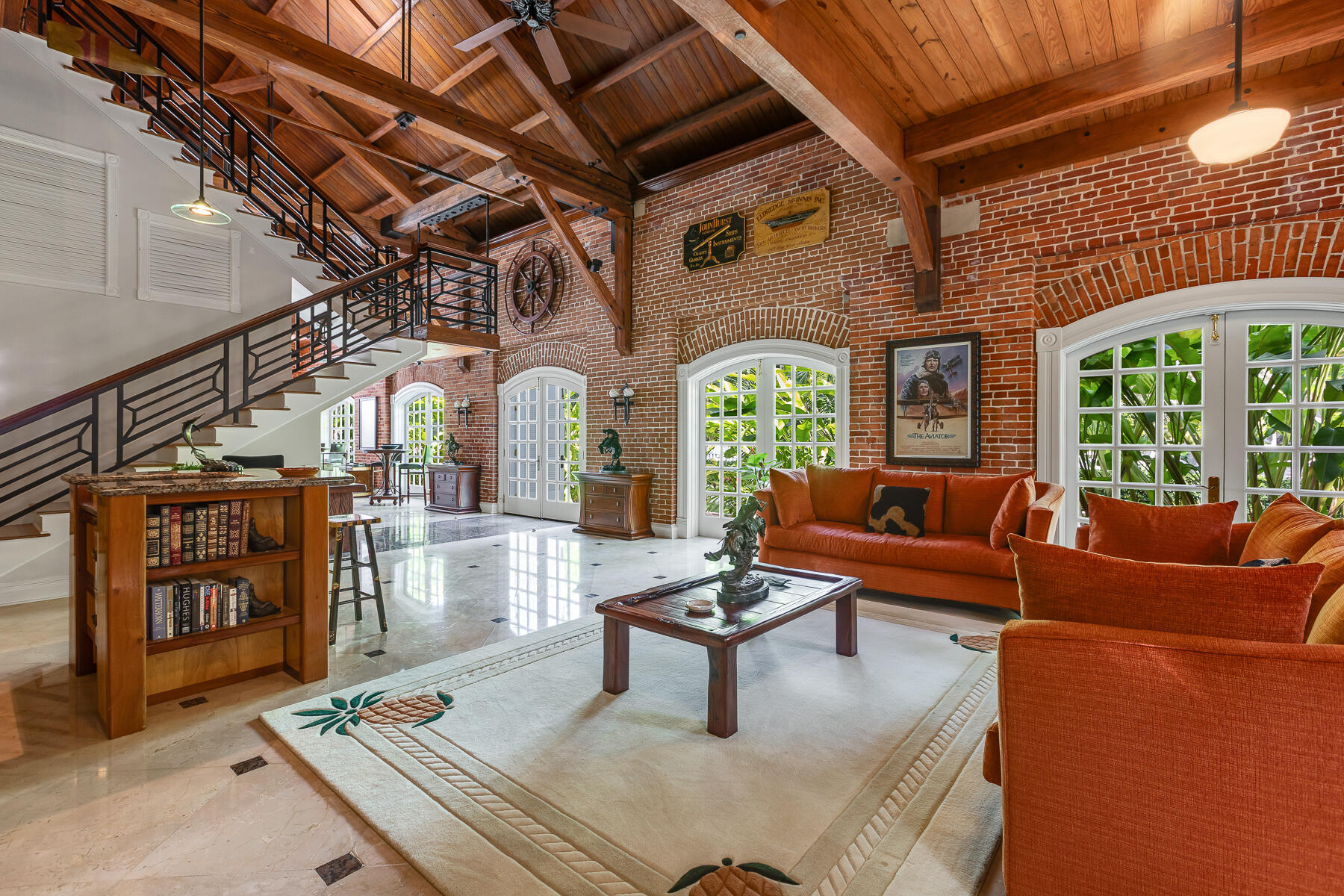 103 Front Street Key West, FL 33040 - Photo 19 of 44 a outdoor living space with patio furniture and a chandelier