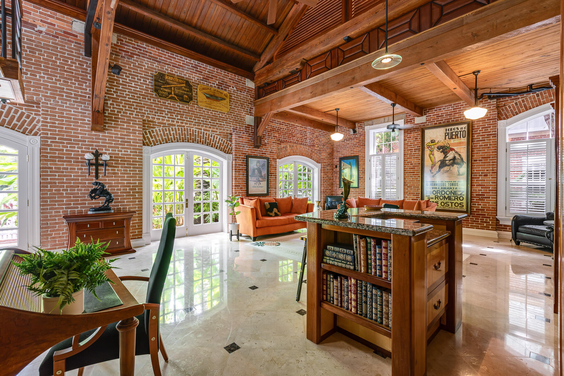 103 Front Street Key West, FL 33040 - Photo 20 of 44 a view of a chairs and tables in the patio