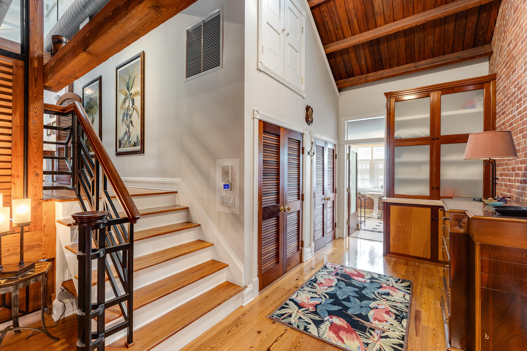 103 Front Street Key West, FL 33040 - Photo 24 of 44 a view of an entryway with wooden floor