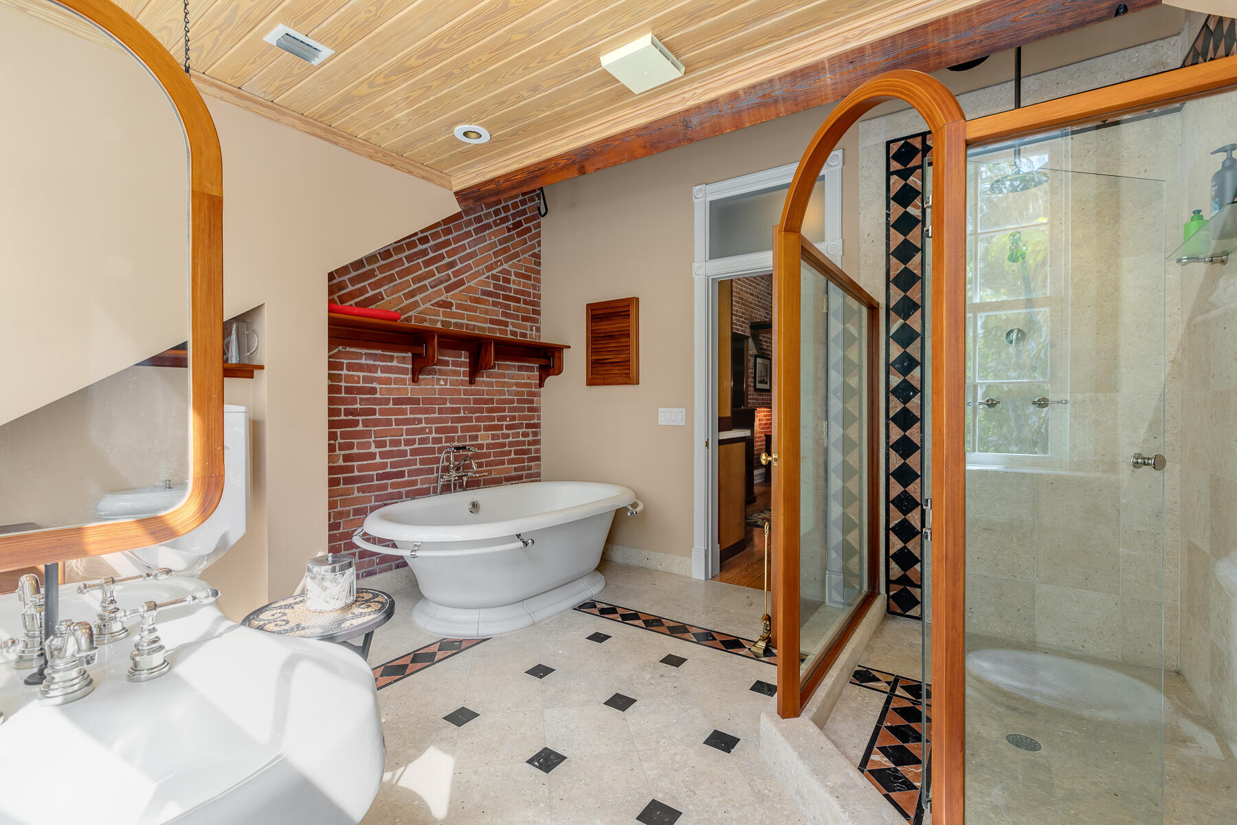 103 Front Street Key West, FL 33040 - Photo 27 of 44 a bathroom with a sink toilet and shower