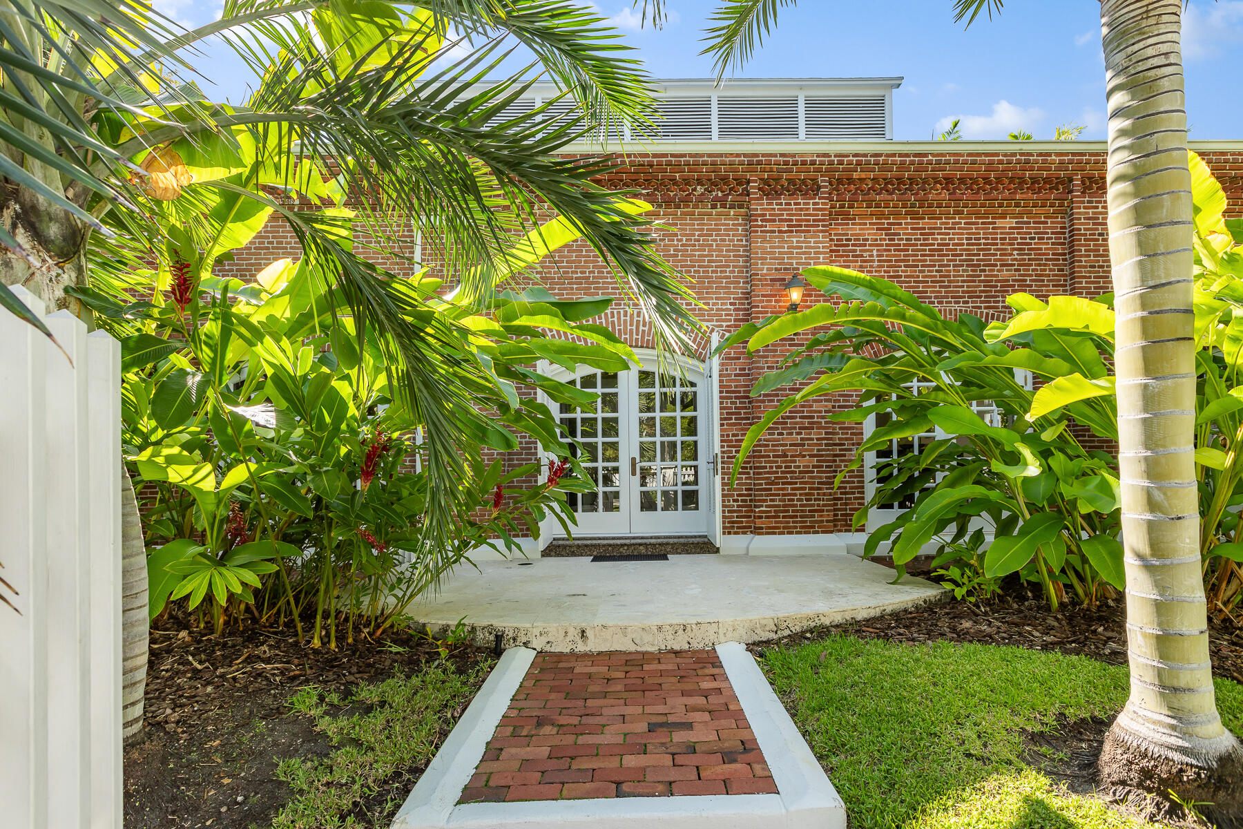 103 Front Street Key West, FL 33040 - Photo 3 of 44 a view of a back yard of the house