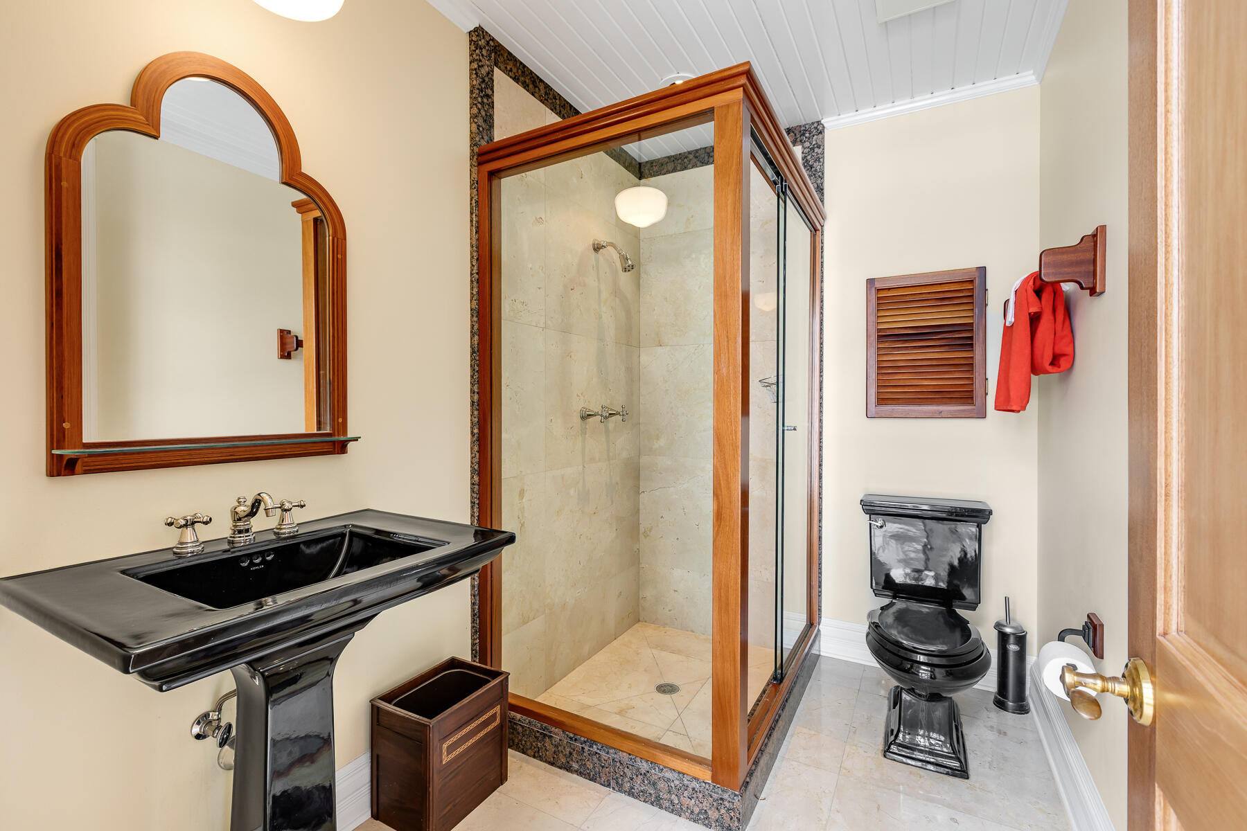 103 Front Street Key West, FL 33040 - Photo 33 of 44 a bathroom with a sink a mirror and shower