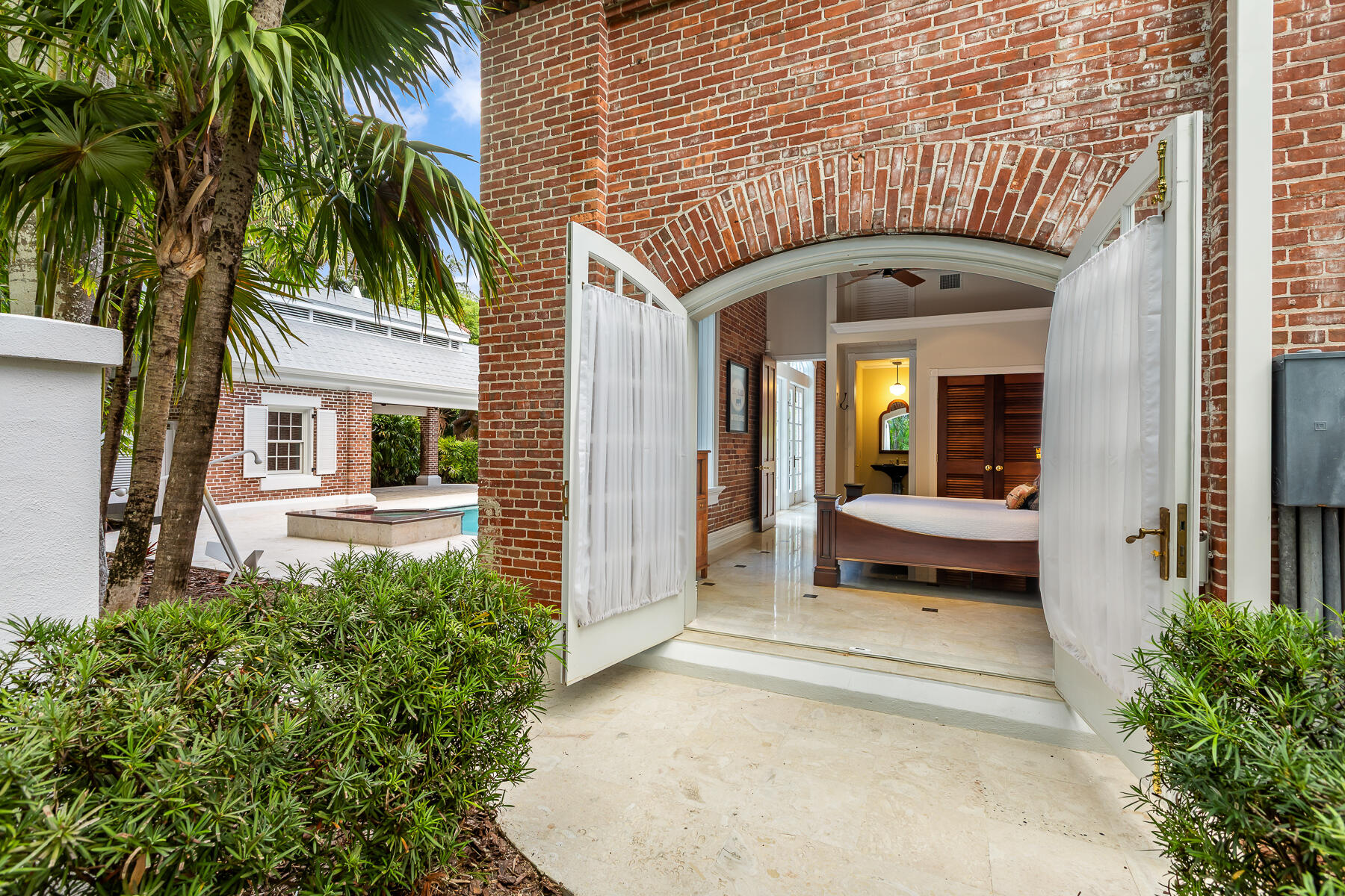 103 Front Street Key West, FL 33040 - Photo 34 of 44 a front view of a house with a porch