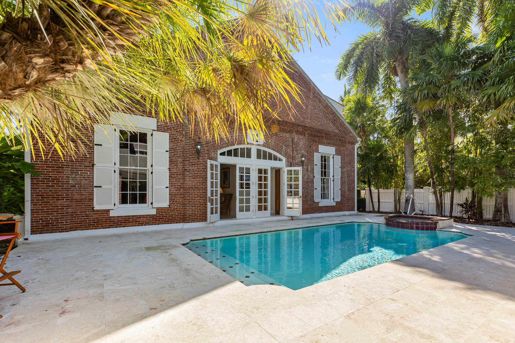 103 Front Street Key West, FL 33040 - Photo 35 of 44 a view of a house with a swimming pool