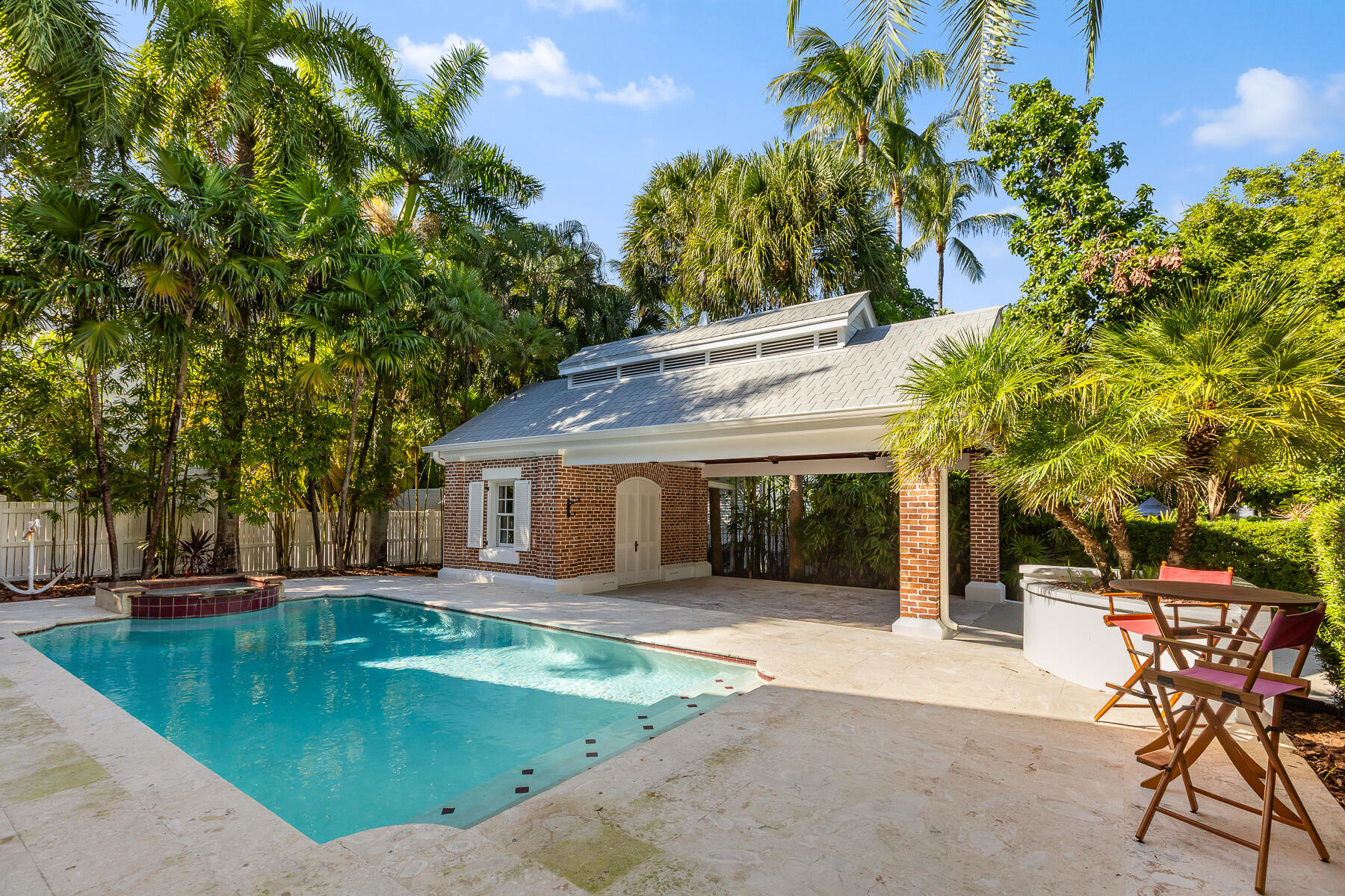103 Front Street Key West, FL 33040 - Photo 36 of 44 a view of a house with backyard porch and sitting area