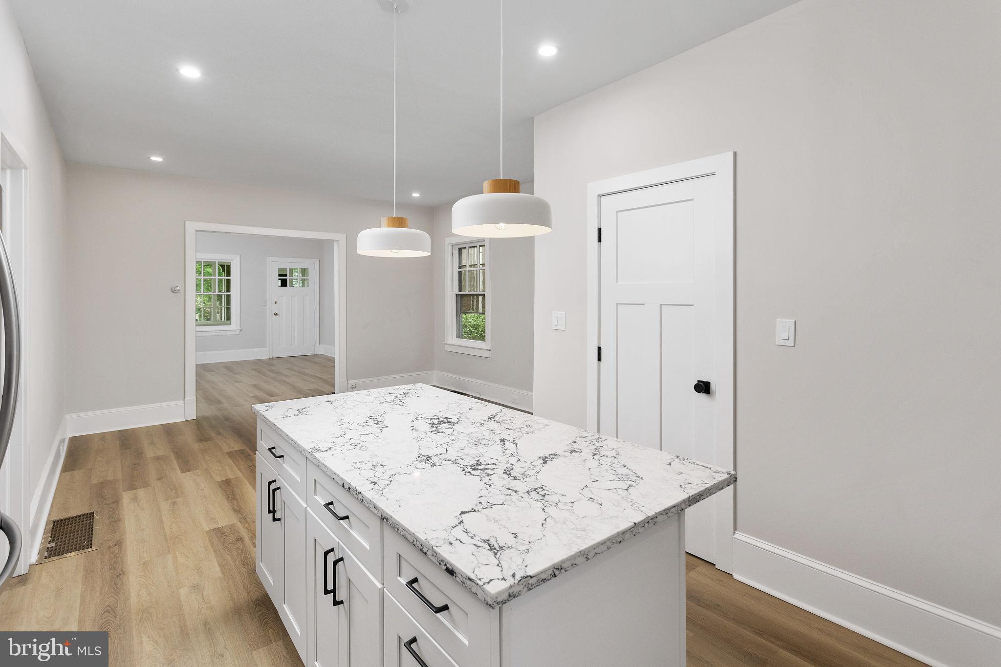 26 Jefferson Road Princeton, NJ 08540 - Photo 12 of 32 a bathroom with a sink a vanity and a mirror