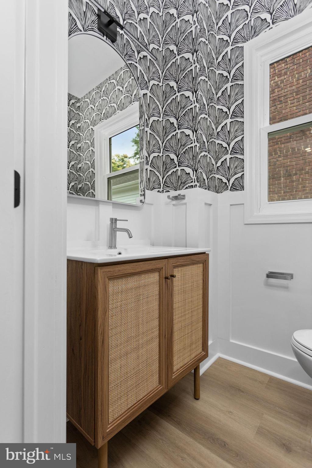 26 Jefferson Road Princeton, NJ 08540 - Photo 16 of 32 a bathroom with a sink and a mirror