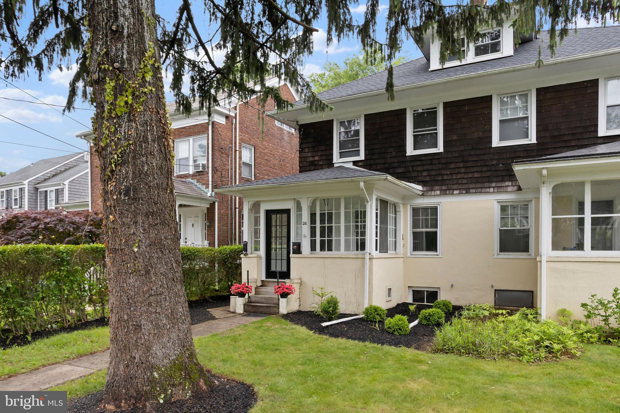 26 Jefferson Road Princeton, NJ 08540 - Photo 2 of 32 a front view of a house with a yard and trees