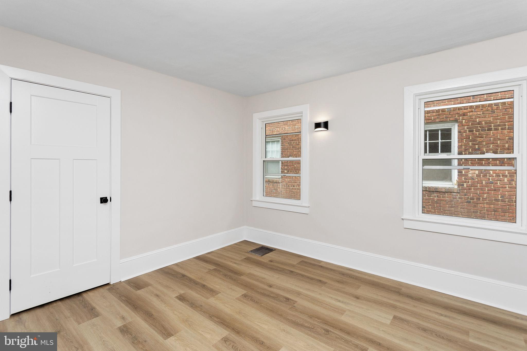 26 Jefferson Road Princeton, NJ 08540 - Photo 25 of 32 a view of empty room with wooden floor and fan