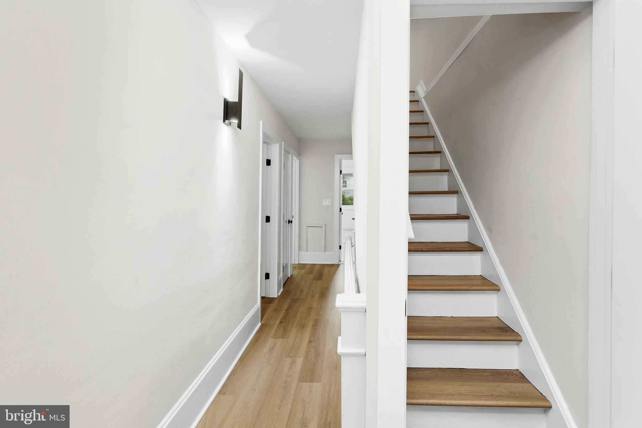 26 Jefferson Road Princeton, NJ 08540 - Photo 26 of 32 a view of a hallway with wooden floor and entryway