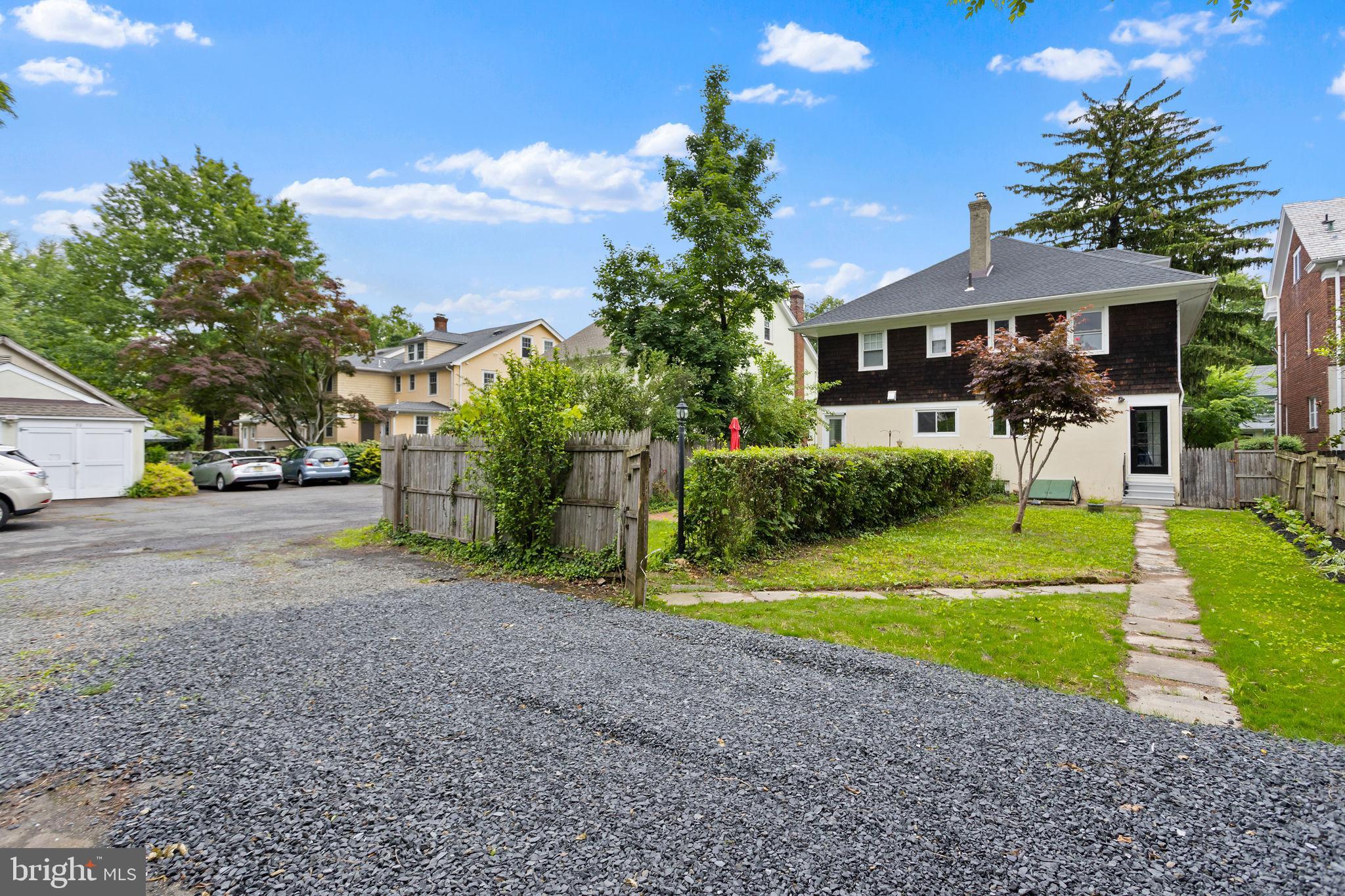 26 Jefferson Road Princeton, NJ 08540 - Photo 30 of 32 a front view of a house with garden