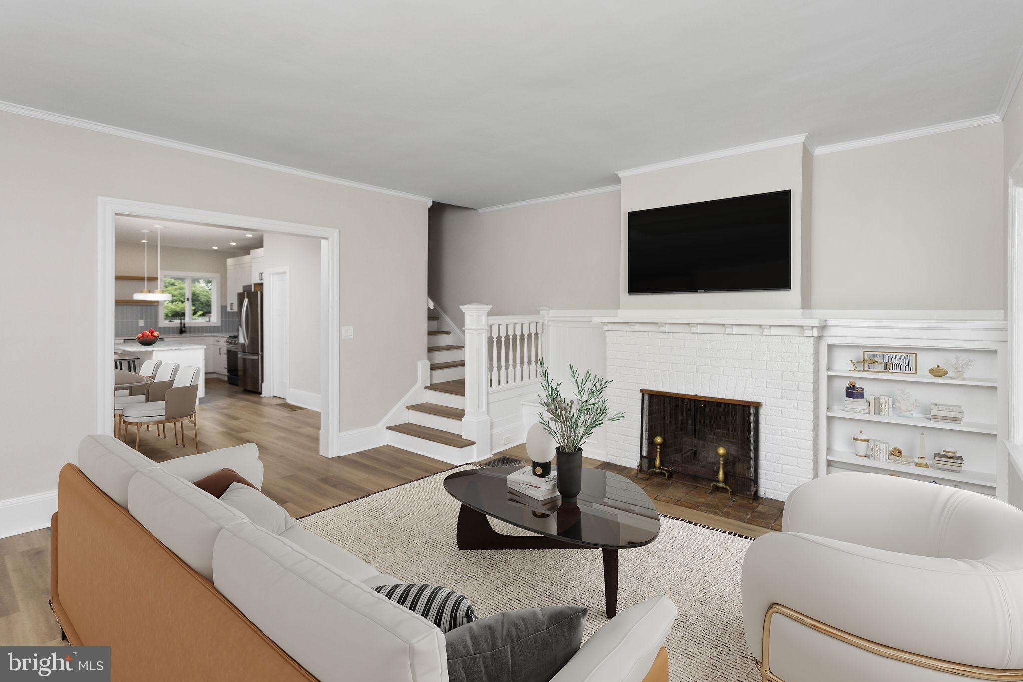 26 Jefferson Road Princeton, NJ 08540 - Photo 7 of 32 a living room with furniture a flat screen tv and a fireplace