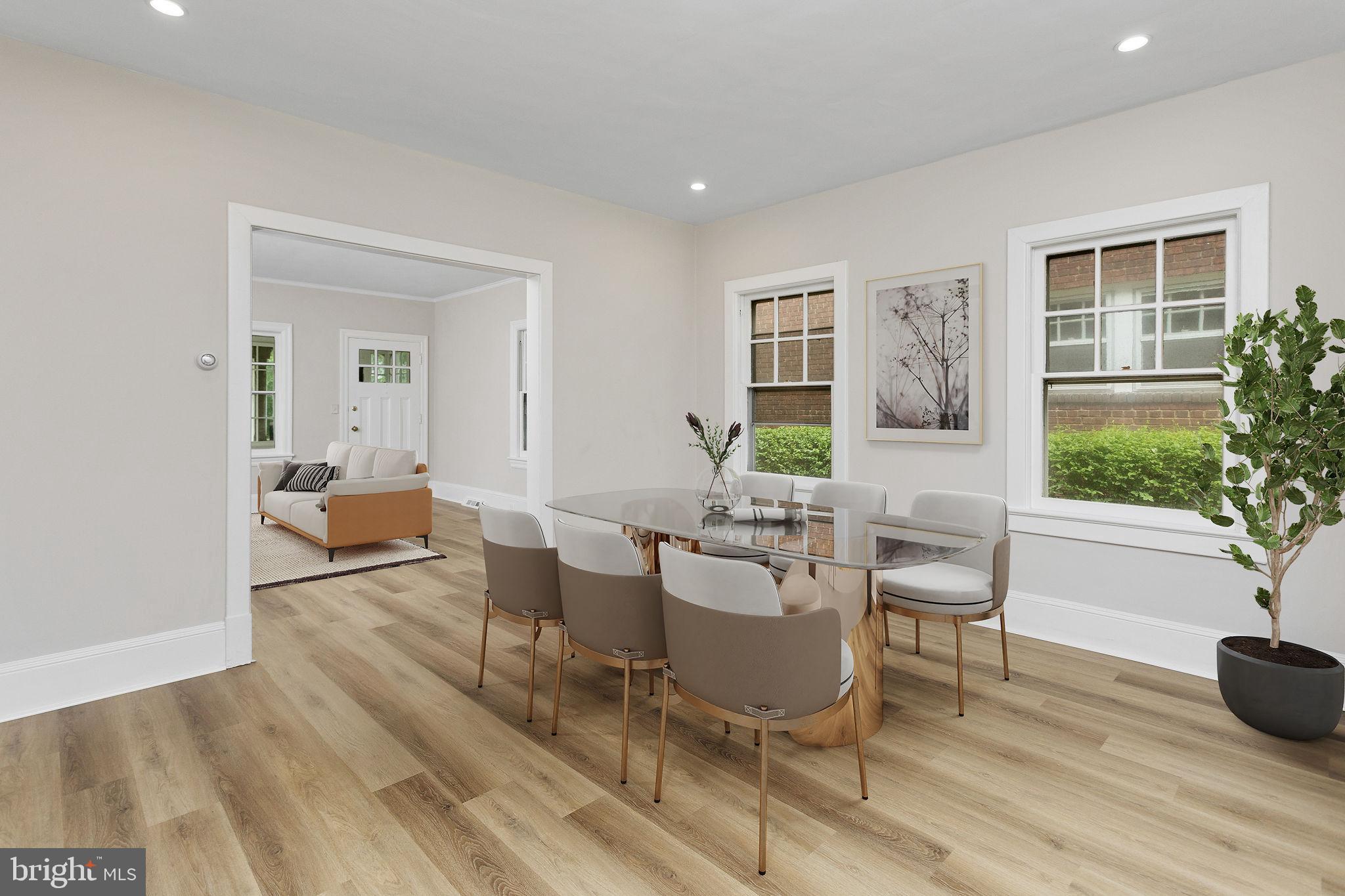 26 Jefferson Road Princeton, NJ 08540 - Photo 9 of 32 a living room with furniture a potted plant and a wooden floor
