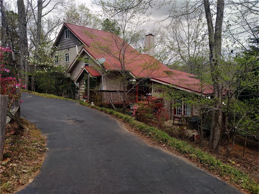a view of a town with barn house