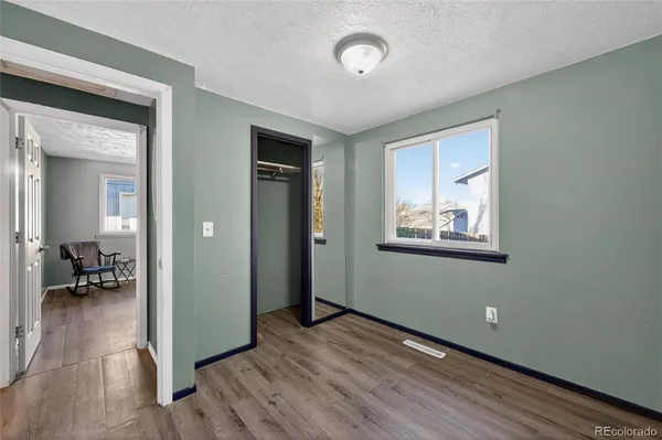 wooden floor and windows in an empty room