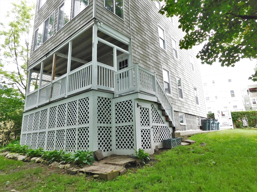 17 Manley Street, Unit 2 Boston, MA 02122 - Photo 16 of 16 a view of a front of a house with a yard