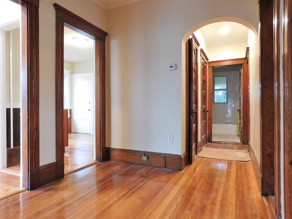 17 Manley Street, Unit 2 Boston, MA 02122 - Photo 5 of 16 a view of a room with wooden floor