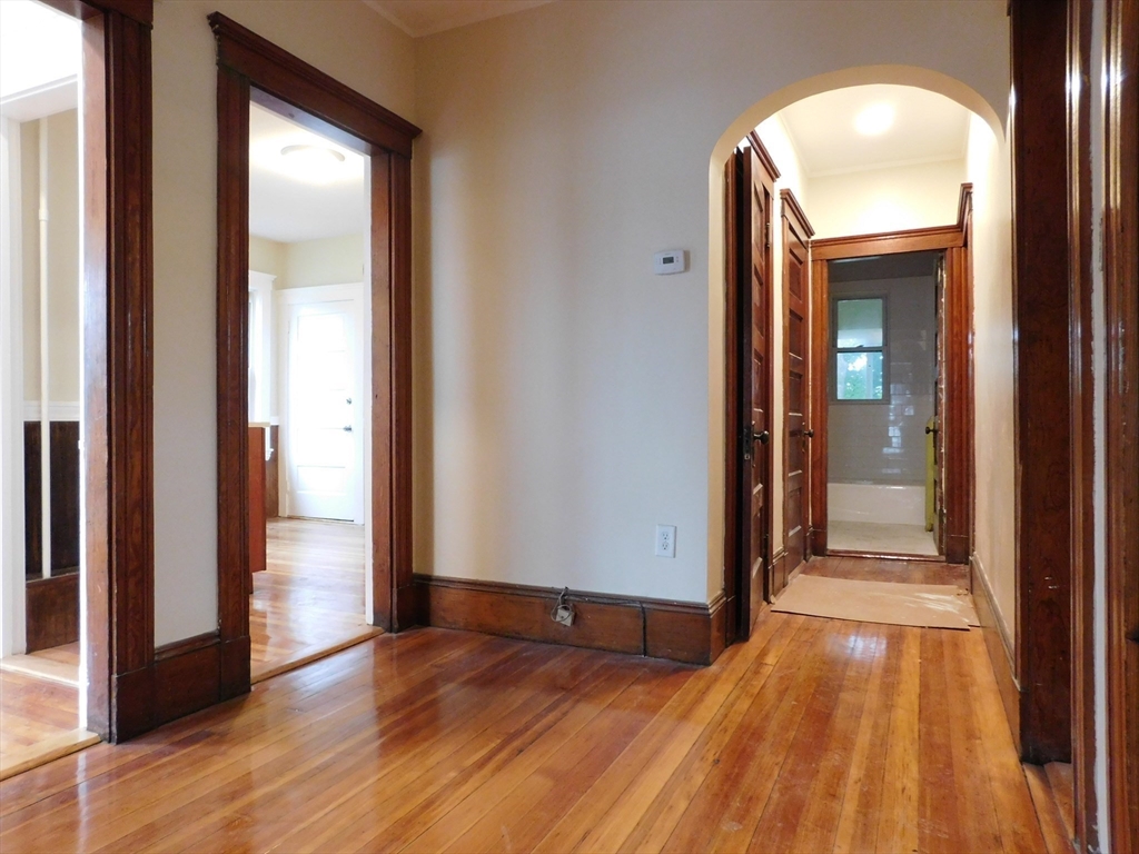 17 Manley Street, Unit 2 Boston, MA 02122 - Photo 10 of 16 a view of a room with wooden floor