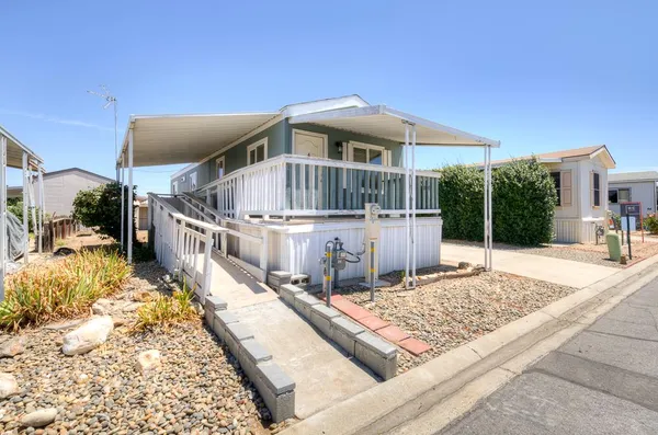 a view of a house with roof deck