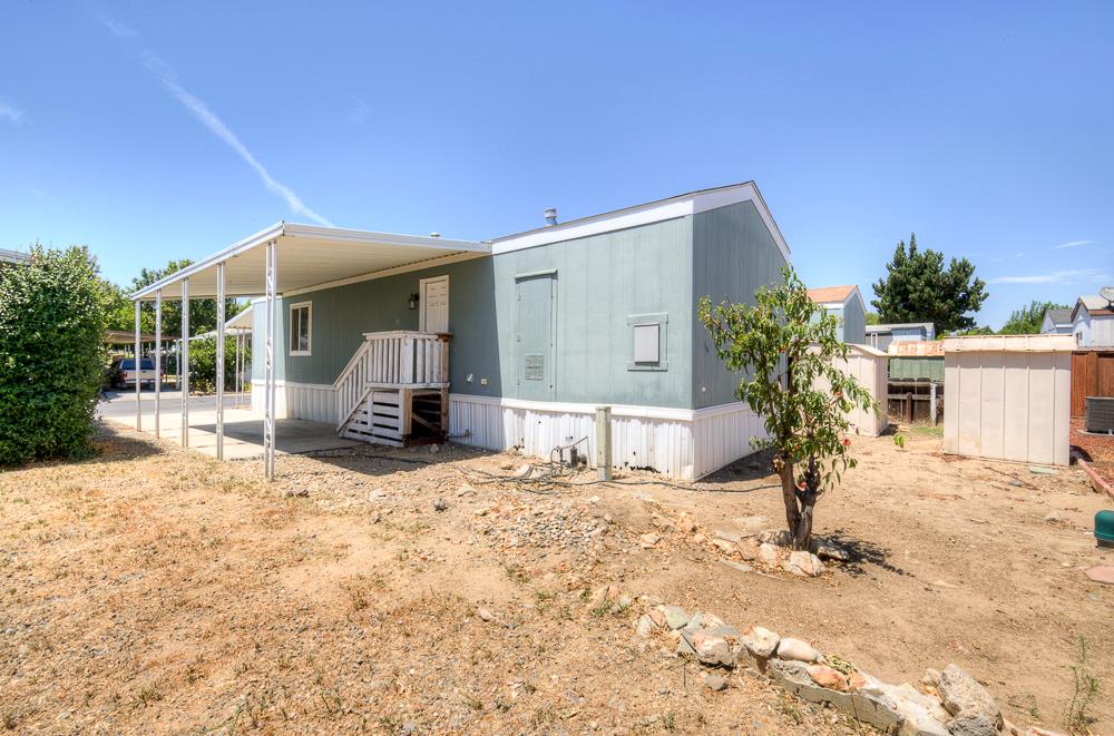 1218 East Cleveland Avenue, Unit 86 Madera, CA 93638 - Photo 4 of 14 a view of a house with snow in front of it
