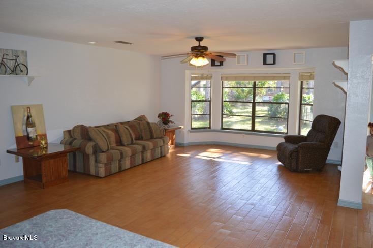 1610 Paragon Road Southeast Palm Bay, FL 32909 - Photo 3 of 85 living room 2