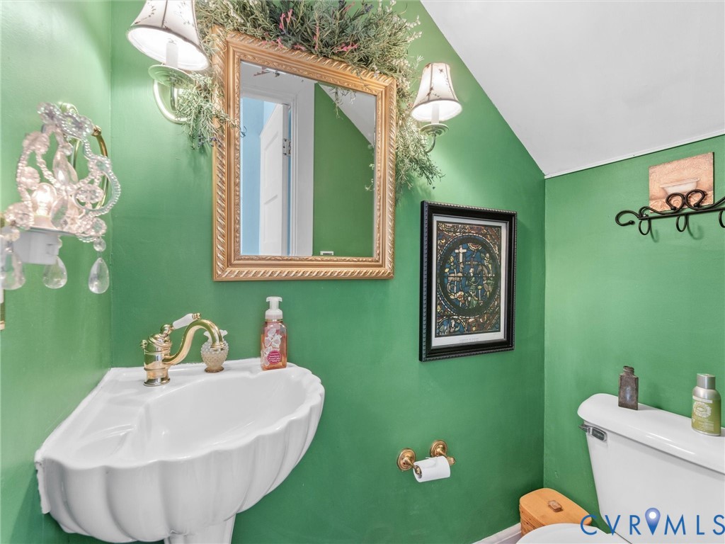 1812 Seddon Road Richmond, VA 23227 - Photo 28 of 56 Pedestal sink with ornate brass faucet, framed mir