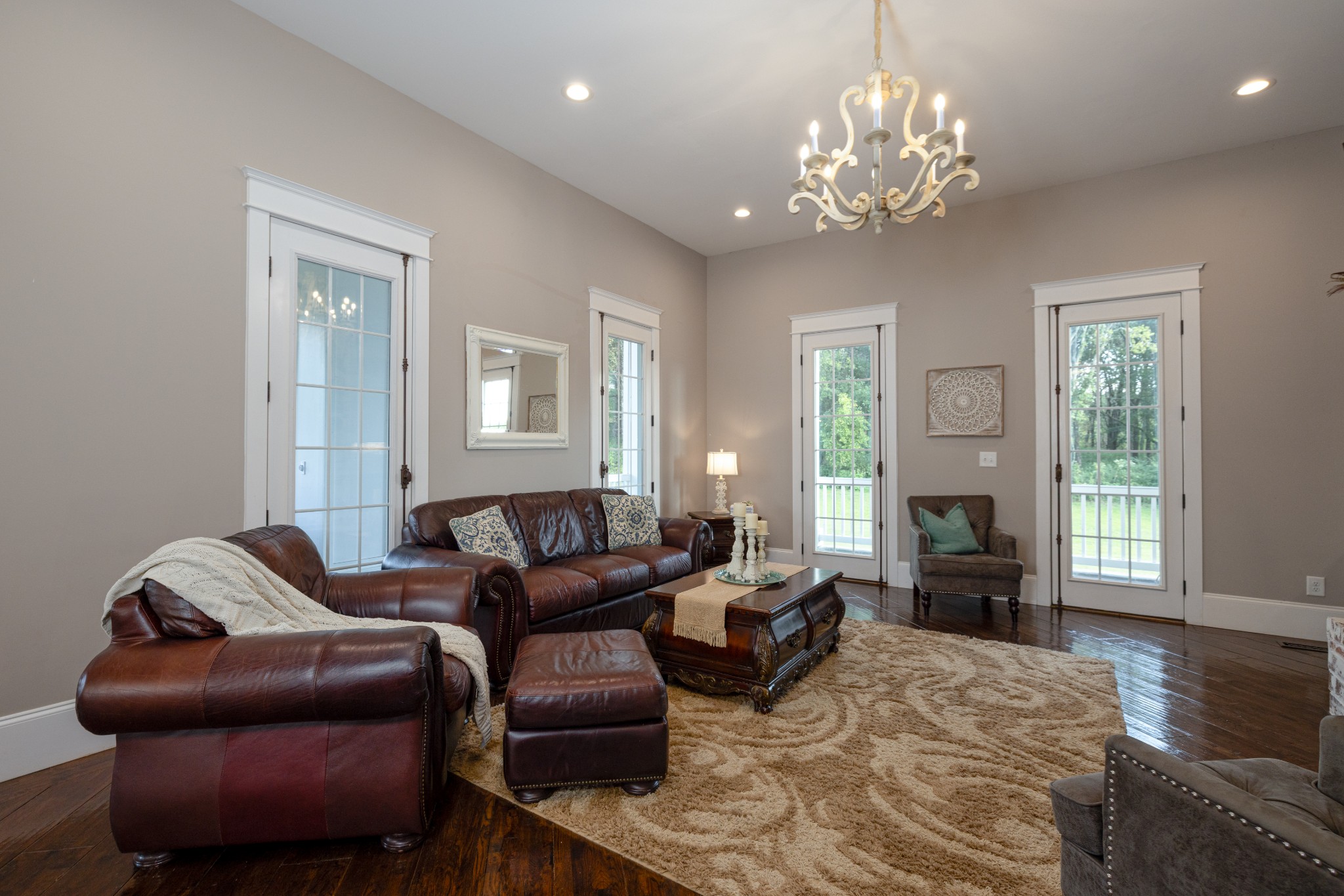 1181 Chicken Road Lebanon, TN 37090 - Photo 14 of 63 a living room with furniture and a chandelier