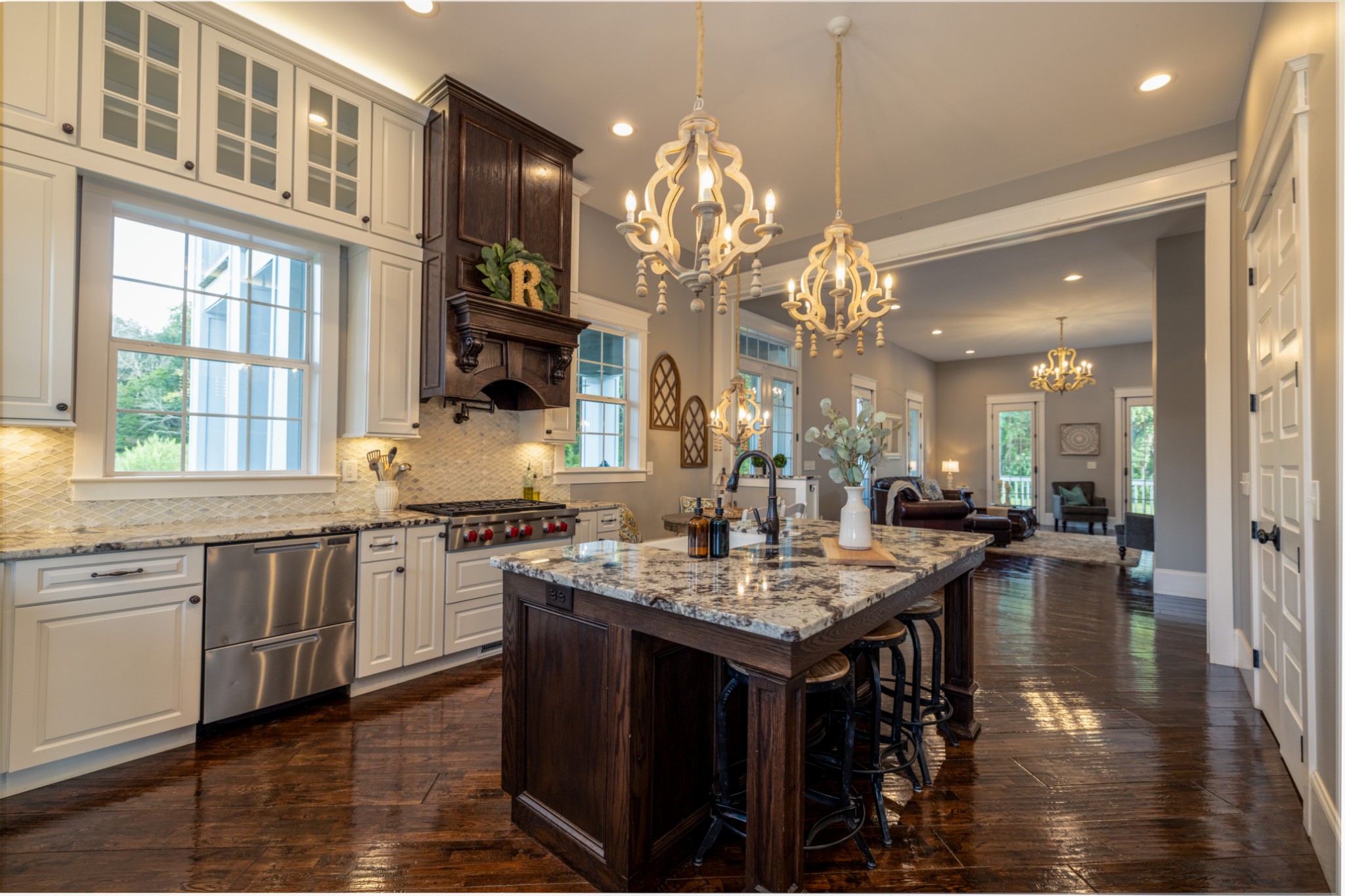 1181 Chicken Road Lebanon, TN 37090 - Photo 17 of 63 a kitchen with center island table and chairs in it