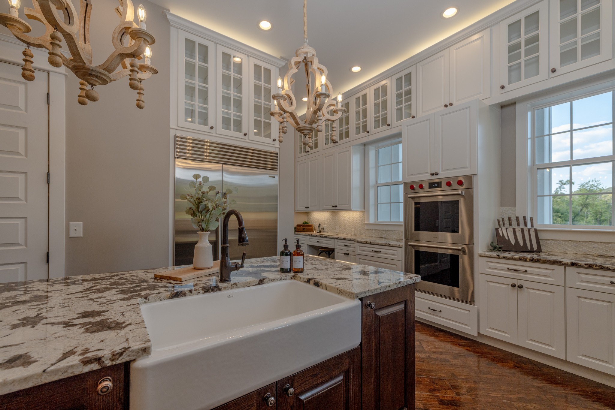 1181 Chicken Road Lebanon, TN 37090 - Photo 19 of 63 a kitchen with kitchen island a sink stove and refrigerator