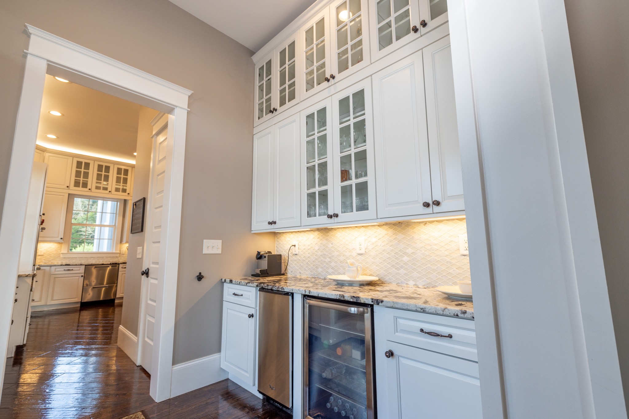 1181 Chicken Road Lebanon, TN 37090 - Photo 22 of 63 a kitchen with granite countertop white cabinets and wooden floor