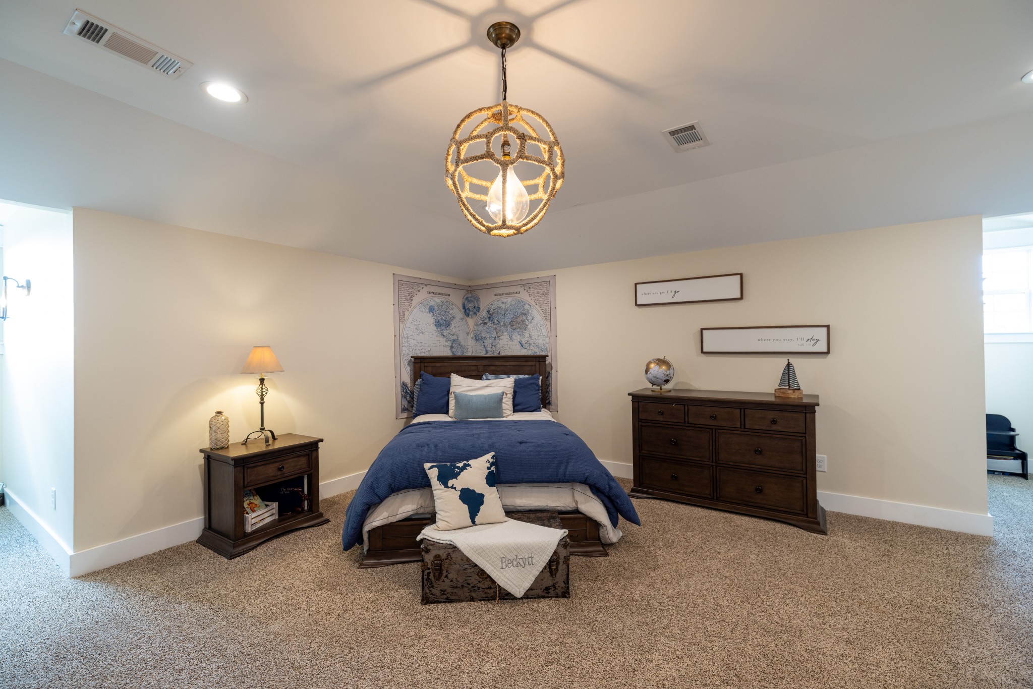 1181 Chicken Road Lebanon, TN 37090 - Photo 34 of 63 a bedroom with a bed and a chandelier