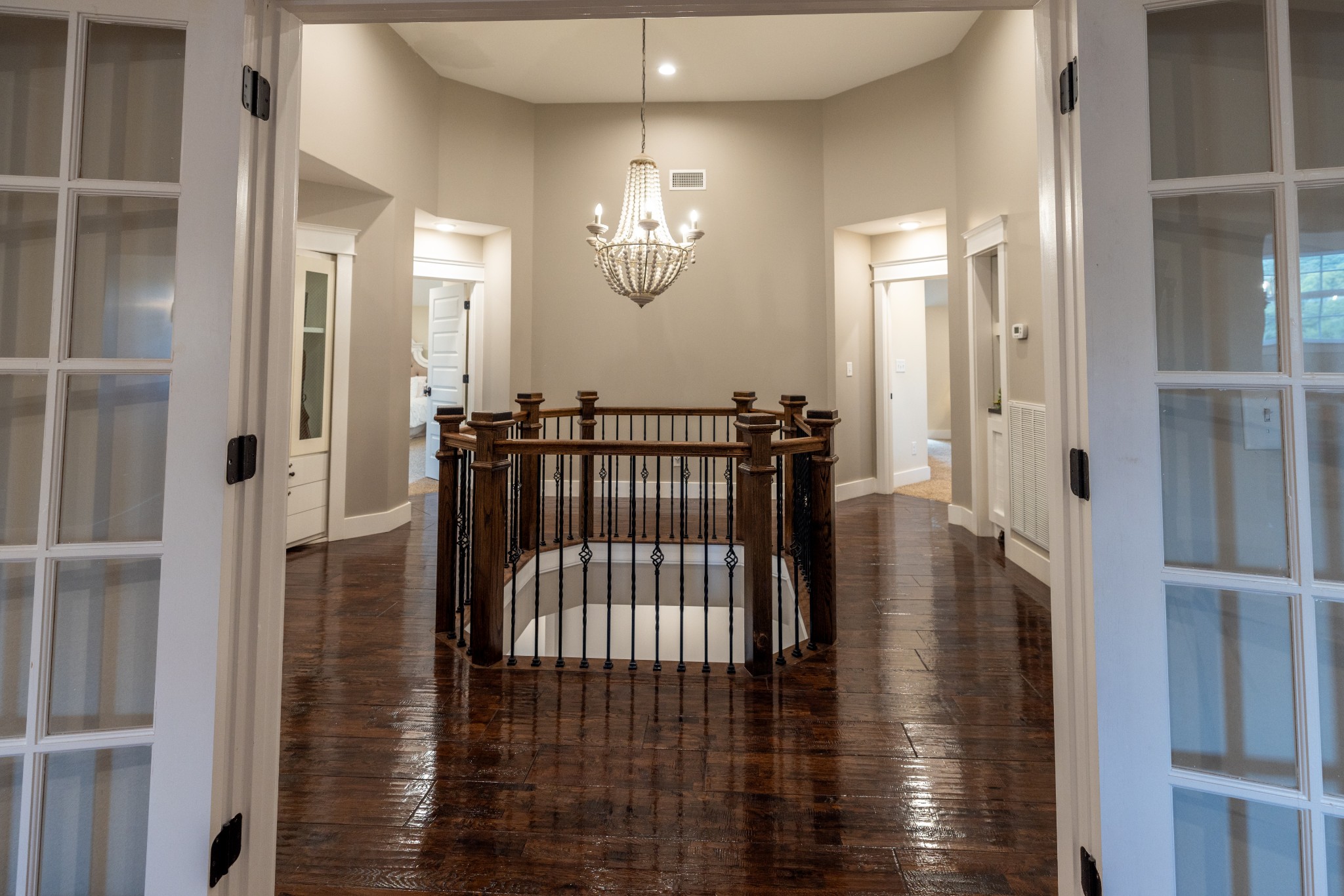 1181 Chicken Road Lebanon, TN 37090 - Photo 39 of 63 a view of a hallway with wooden floor and staircase