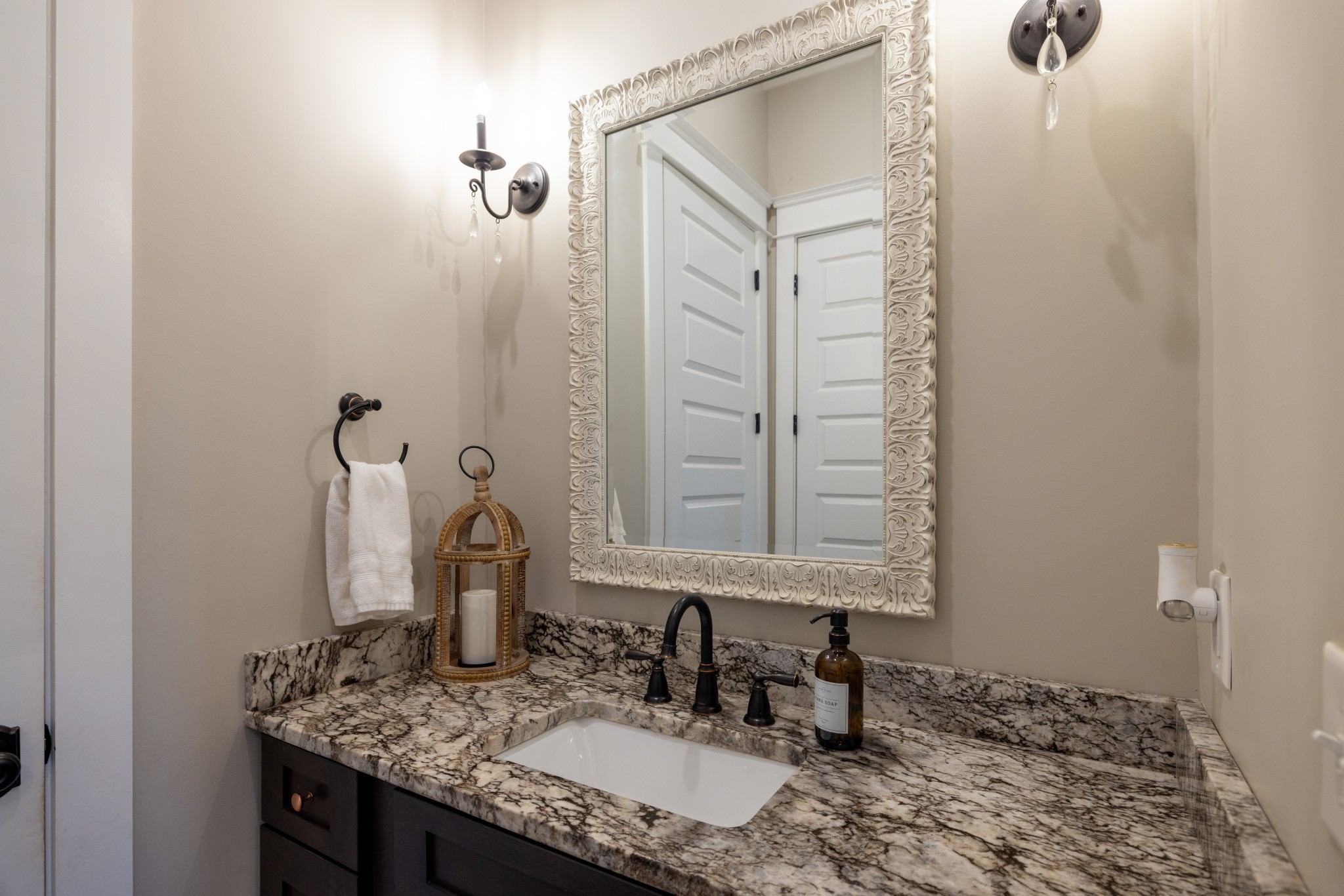 1181 Chicken Road Lebanon, TN 37090 - Photo 42 of 63 a bathroom with a granite countertop sink and a mirror
